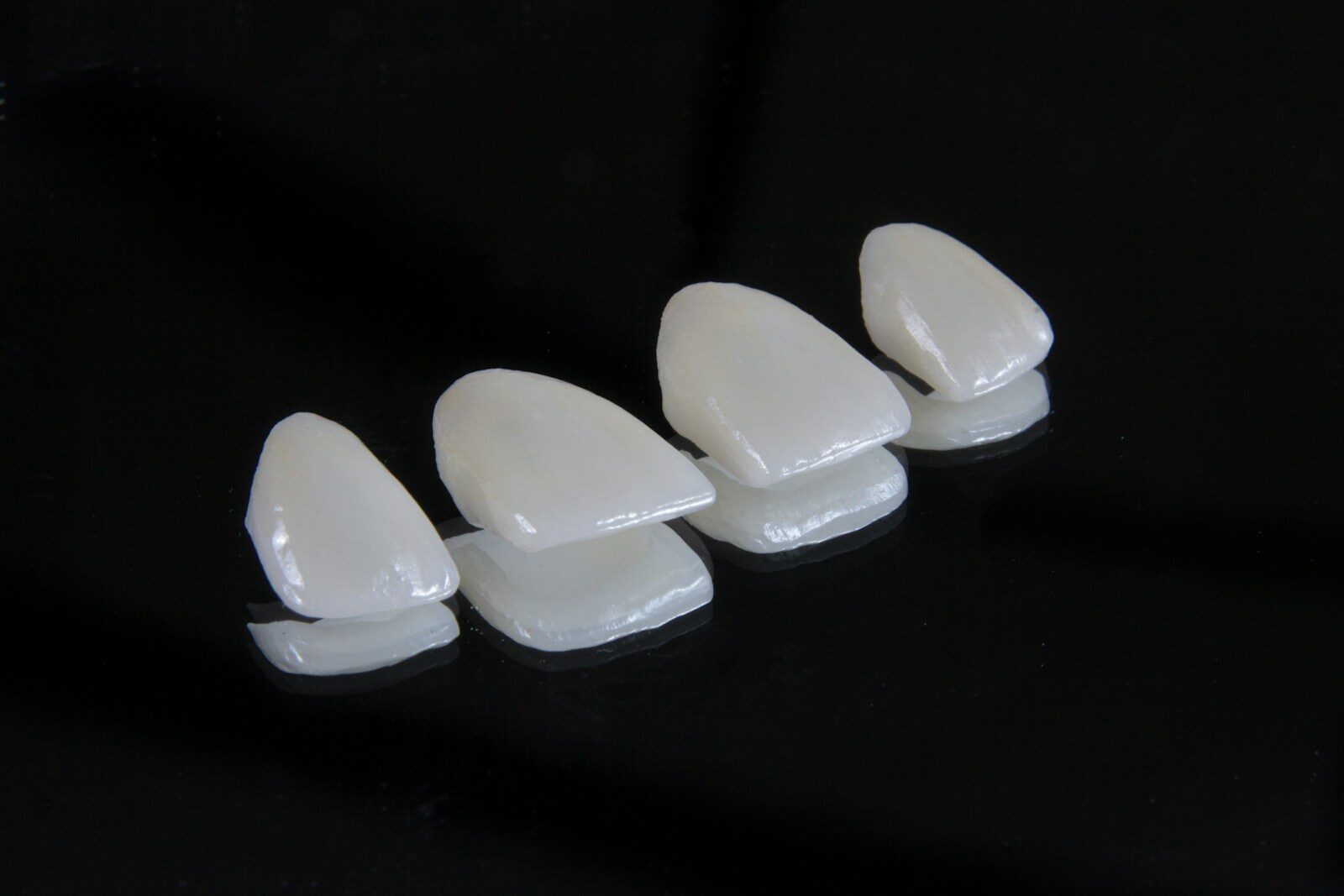 Chipped Tooth a group of white objects